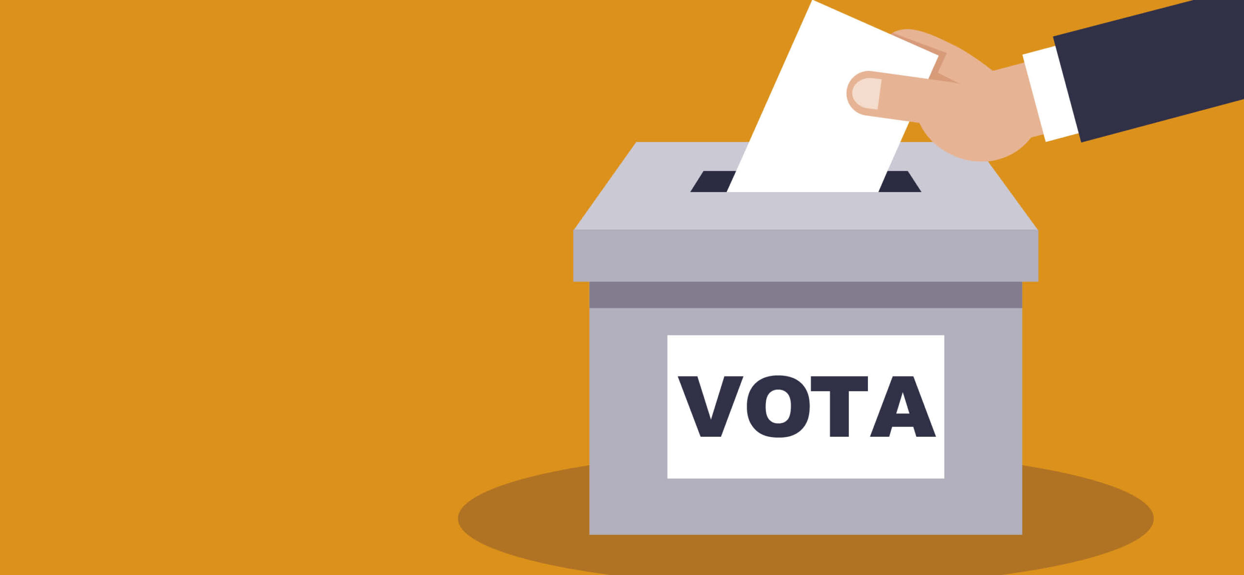 Elezioni amministrative 2020: immagine di mano che inserisce una scheda elettorale nella scatola del voto.